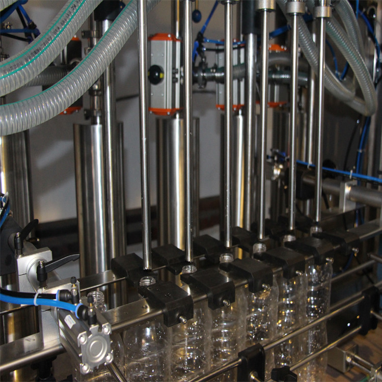 riempitrice di olio di cocco